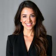 Professional photo of Elena Petrova.